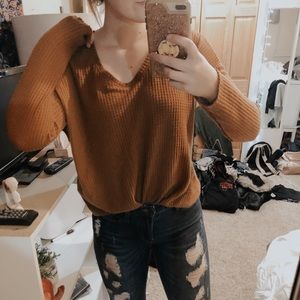 Burnt orange sweater